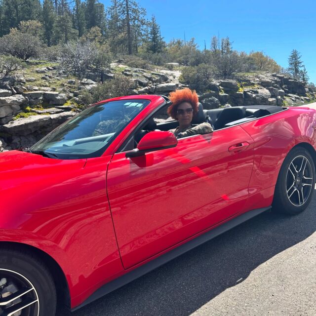 No filter! …yes - and just posing! Not driving this through the beautiful Yosemite National Park, but our tourists’ 🚗❤️ I know I haven’t done a post here about my brand new Job! I will next! ✌️  #tourguideslife #yosemitenationalpark🌲 #redmustang #convertiblechickmode #redhot #newlifestyle #weekendvibes😎 #outdooradventures #outdoorswoman #bighairday #windhair #redhotfeatures